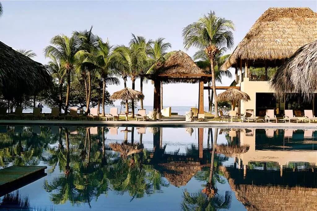 Flaming Beach Resort pool and beach
